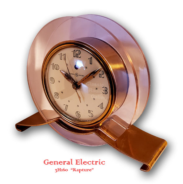 Telechron 3H160 Rapture, double pink lucite rings on brass base