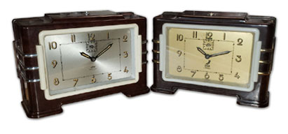 Jaz brown bakelite with white plaskon and brass trim clock